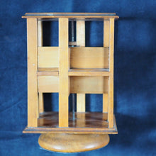 Load image into Gallery viewer, Revolving Bookcase. Slim, revolving, sycamore bookcase for miniature books. 1904.