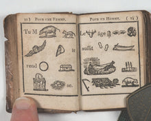 Load image into Gallery viewer, Petit oracle des amans, ou, Les horoscopes de l'amour, mis en rébus : ouvrage dans lequel chacun peut trouver toutes les vérités plaisantes qui le concernent. Castiaux, Libraire. Lille. Circa 1822.
