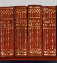 Load image into Gallery viewer, ATTRACTIVE DESK SET OF FOUR LEATHER-BOUND LILLIPUT DICTIONARIES (ENGLISH, FRENCH AND GERMAN). BY PROF. WERSHOVEN. >>MINIATURE BOOK<<