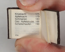 Load image into Gallery viewer, Kleinste Kochbuch der Welt. [Bolzano] Bozen. 1985. Smallest cookbook in the world. What do people eat and drink in Tyrol? 50 recipes for Tyrolean dishes. 2nd edition. 1985.
