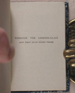 Carroll, Lewis. Alice in Wonderland [with] Alice through the Looking-Glass and what Alice found there. Wood, Edmund S. Paris. 1950.