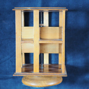 Revolving Bookcase. Slim, revolving, sycamore bookcase for miniature books. 1904.