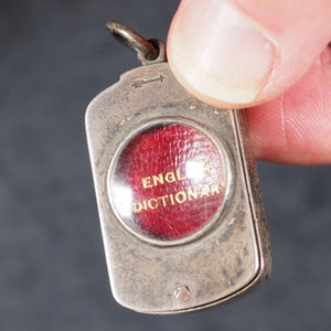 Smallest English Dictionary in the World. Comprising: besides the ordinary & newest words in the language, short explanations of a large number of scientific, philosophical, literary & technical terms. Bryce, David & Son. Glasgow. 1893. SILVER LOCKET