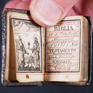 Biblia or a Practical Summary of Old & New Testaments. 1728. Wilkin, R. [London]. 1727. Underlined in red and hand corrected to 1728. Black binding.