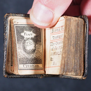 Biblia or a Practical Summary of Old & New Testaments. 1728. Wilkin, R. [London]. 1727. Underlined in red and hand corrected to 1728. Black binding.