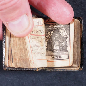 Biblia or a Practical Summary of Old & New Testaments. 1728. Wilkin, R. [London]. 1727. Underlined in red and hand corrected to 1728. Black binding.