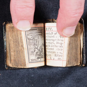 Biblia or a Practical Summary of Old & New Testaments. 1728. Wilkin, R. [London]. 1727. Underlined in red and hand corrected to 1728. Black binding.