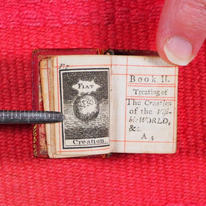 Biblia or a Practical Summary of Old & New Testaments. 1728. Wilkin, R. [London]. 1727. Underlined in red and hand corrected to 1728. Red binding.