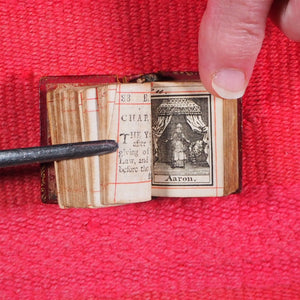 Biblia or a Practical Summary of Old & New Testaments. 1728. Wilkin, R. [London]. 1727. Underlined in red and hand corrected to 1728. Red binding.