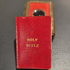 Holy Bible c1901     The Holy Bible Containing the Old and New Testaments     Translated out of the Original Tongues... by His     Majesty's Special Command. Bound in red cloth. 876pp.