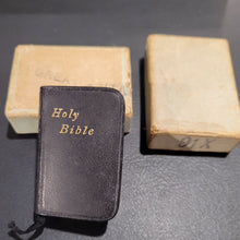 Load image into Gallery viewer, Holy Bible c1914  3/4&quot; x 1 1/4&quot;  Bound in black leather with gilt title to front cover and spine. Gilt edges.  Contained in an unmarked cardboard box
