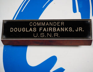 Douglas Fairbanks, Jr.'s own, unique wooden desk plaque with his name and rank. Fairbanks was a Hollywood Legend and Decorated War Hero.